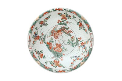 Lot 53 - A CHINESE FAMILLE VERTE RIBBED 'PHOENIX AND PEONIES' BOWL.