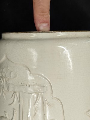 Lot 89 - A CHINESE MOULDED DEHUA 'GOATS AND CRANES' VASE