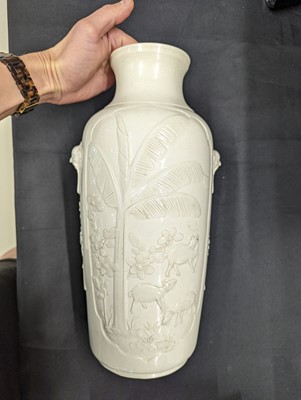 Lot 69 - A CHINESE MOULDED DEHUA 'GOATS AND CRANES' VASE.