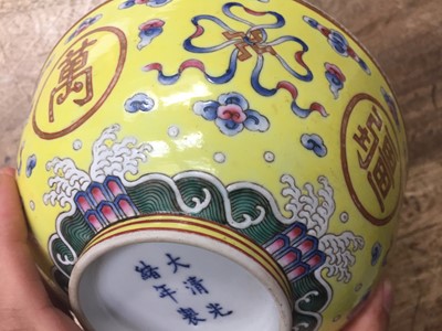 Lot 129 - A CHINESE FAMILLE-ROSE YELLOW-GROUND BOWL