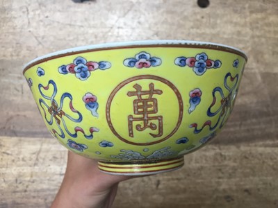 Lot 129 - A CHINESE FAMILLE-ROSE YELLOW-GROUND BOWL