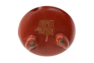 Lot 41 - A CHINESE CORAL-GLAZED DOUBLE GOURD WATER DROPPER.