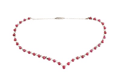 Lot 51 - An articulated ruby and diamond necklace