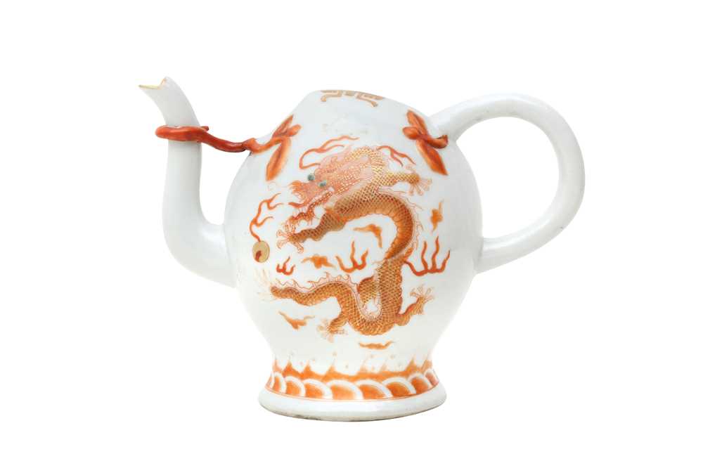 Lot 368 - A CHINESE IRON-RED 'DRAGON' CADOGAN TEAPOT.