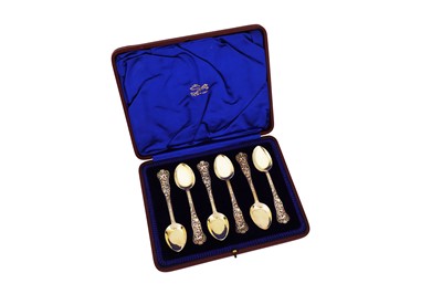 Lot 518 - A cased set of Victorian sterling silver gilt ice cream spoons, London 1894 by Wakley and Wheeler