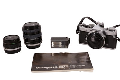 Lot 453 - An Olympus OM1 SLR Camera Outfit