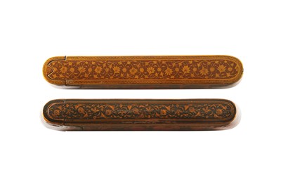 Lot 36 - TWO LACQUERED PAPIER-MÂCHÉ PEN CASES (QALAMDAN) WITH SCENIC VIEWS AND GOL-O-BOLBOL MOTIFS
