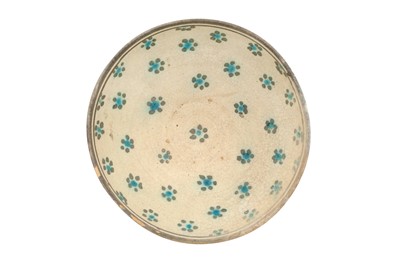 Lot 3 - A KASHAN TURQUOISE AND BLACK POTTERY BOWL WITH ROSETTES
