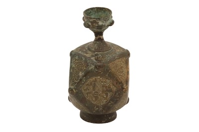 Lot 6 - A SMALL ENGRAVED AND FACETED BRONZE BOTTLE