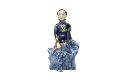 Lot 387 - A CHINESE FAMILLE ROSE FIGURE OF A LADY.