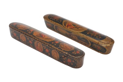 Lot 29 - TWO LACQUERED PAPIER-MÂCHÉ PEN CASES (QALAMDAN) WITH PORTRAITS OF FOREIGN MAIDENS