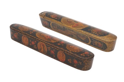Lot 29 - TWO LACQUERED PAPIER-MÂCHÉ PEN CASES (QALAMDAN) WITH PORTRAITS OF FOREIGN MAIDENS