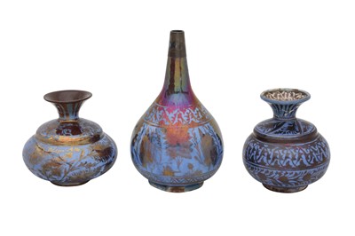 Lot 12 - THREE SAFAVID BLUE AND COPPER LUSTRE-PAINTED POTTERY BOTTLES