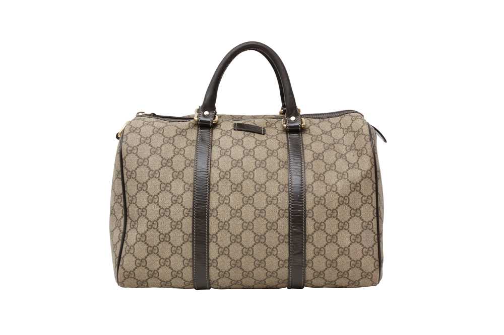 Lot 97 - Gucci Beige Monogram Joy Medium Boston Bag