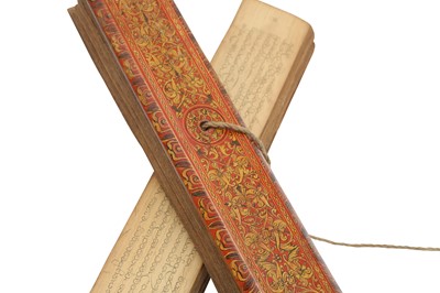 Lot 293 - A PALM-LEAF BUDDHIST MANUSCRIPT WITH LACQUERED BOOK COVERS