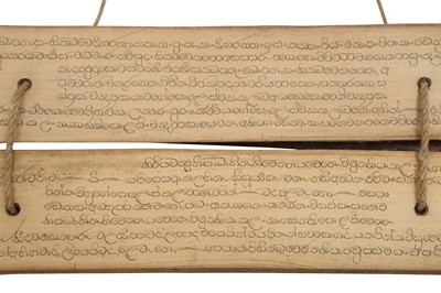 Lot 293 - A PALM-LEAF BUDDHIST MANUSCRIPT WITH LACQUERED BOOK COVERS