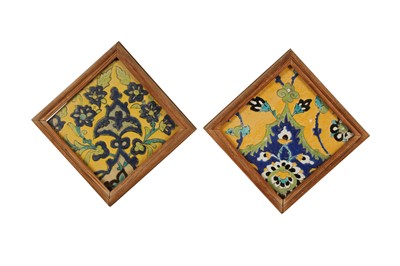Lot 481 - *TWO CUERDA SECA POTTERY TILES WITH FLORAL DESIGN