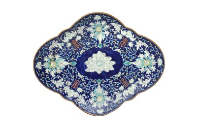 Lot 1013 - A CHINESE QUATREFOIL BLUE-GROUND FOOTED FISH
