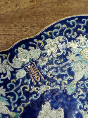 Lot 136 - A CHINESE QUATREFOIL BLUE-GROUND FOOTED FISH