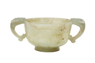Lot 298 - A CHINESE CELADON JADE TWIN-HANDLED CUP