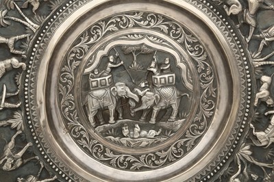 Lot 313 - AN INDIAN SILVER REPOUSSÉ PLATE WITH A HUNTING SCENE