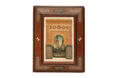 Lot 514 - λ A GILT AND POLYCHROME-PAINTED PLASTER RELIEF PLAQUE OF THE ALHAMBRA