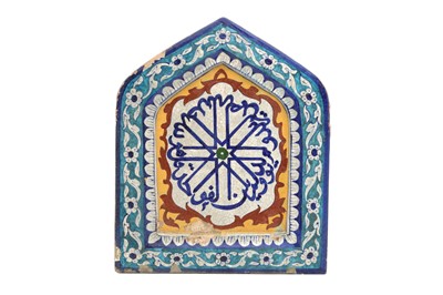 Lot 486 - A MULTAN ARCHITECTURAL POTTERY TILE WITH SURA AL-IKHLAS