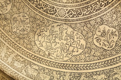 Lot 456 - A LARGE ENGRAVED BRASS TRAY WITH CHARACTERS FROM NIZAMI'S KHAMSEH
