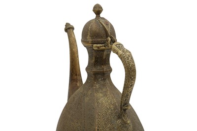 Lot 309 - AN ENGRAVED BRASS SPOUTED EWER WITH BLACK LAC INLAY