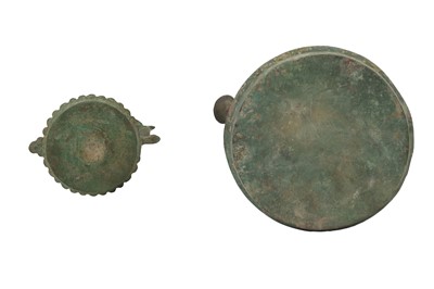 Lot 531 - TWO BRONZE SINGLE-SPOUTED OIL LAMPS