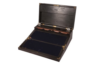 Lot 247 - A NINETEENTH  EBONY WRITING SLOPE