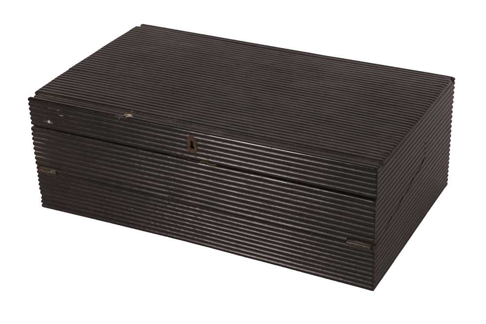 Lot 247 - A NINETEENTH  EBONY WRITING SLOPE