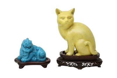 Lot 208 - A CHINESE YELLOW-GLAZED FIGURE OF A CAT TOGETHER WITH A TURQUOISE BEIJING GLASS MODEL OF A QILIN