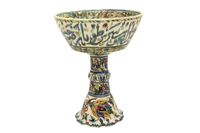 Lot 287 - A POLYCHROME-PAINTED THULUTH-INSCRIBED KUTAHYA POTTERY OFFERING BOWL