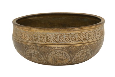 Lot 522 - AN ENGRAVED EARLY OTTOMAN GILT COPPER (TOMBAC) BASIN