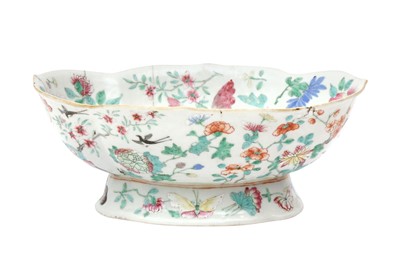 Lot 133 - A CHINESE FAMILLE-ROSE 'BUTTERFLY' FOOTED BOWL