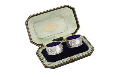 Lot 358 - A cased set of early 20th century Anglo – Indian silver napkin rings, Madras circa 1910 by Peter Orr and Co