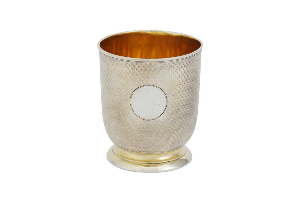 Lot 588 - A Victorian sterling silver gilt beaker,