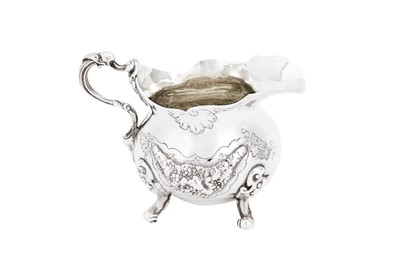 Lot 593 - An early Victorian sterling silver cast cream or milk jug, London 1839 by Sebastian Crespel II