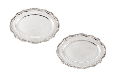 Lot 687 - A pair of George II sterling silver meat dishes, London 1754 by Magdalene Feline (reg. 15th May 1753)