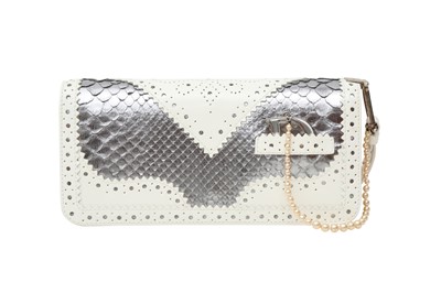 Lot 714 - λ Christian Dior Silver Python D'Trick Wristlet Clutch