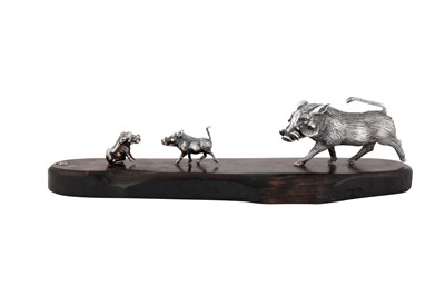 Lot 340 - A contemporary Zimbabwean model of a warthog family, Harare by Patrick Mavros