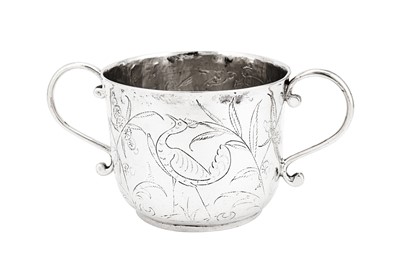 Lot 730 - A rare James II sterling silver 'Chinoiserie' porringer, London 1685 by John Richardson (free. 1669, died. 1698)