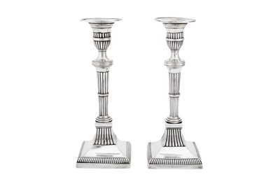 Lot 501 - A pair of early 19th century Portuguese silver candlesticks, Porto circa 1810 by AIR (unidentified)