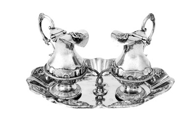 Lot 499 - A late 19th century Portuguese silver altar cruet set, Porto dated 1878 by José Monteriro de Carvalho