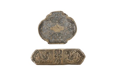 Lot 384 - TWO BRASS DECORATIVE MOULDS FOR TOOLING LEATHER COVERS