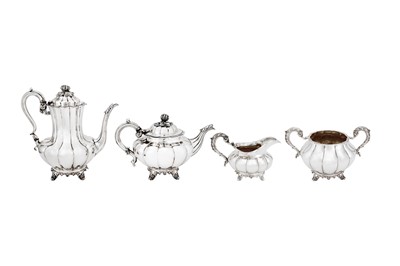 Lot 410 - A closely matched Victorian sterling silver four-piece tea and coffee service