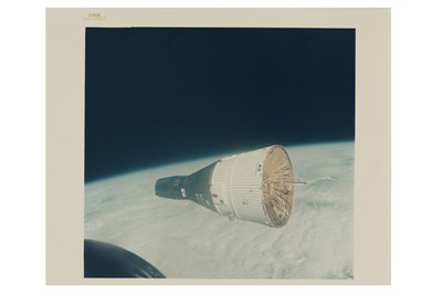 Lot 91 - The Sun illuminating the Gemini VII spacecraft in Earth orbit