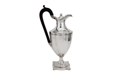 Lot 666 - A George III sterling silver wine ewer, London 1787 by Henry Chawner (reg. 11th Nov 1786)