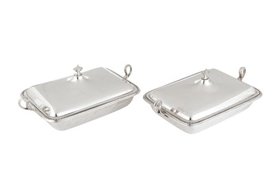 Lot 581 - A pair of Edwardian sterling silver entrée dishes with liners, London 1909 by Thomas Bradbury and Sons